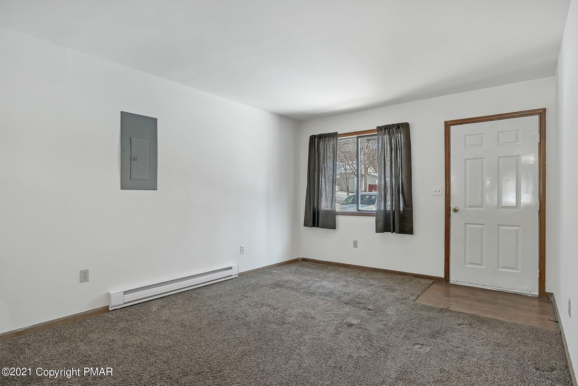 1908 Johns Road Effort, PA 18330 - Photo 5 of 23 an empty room with windows and closet