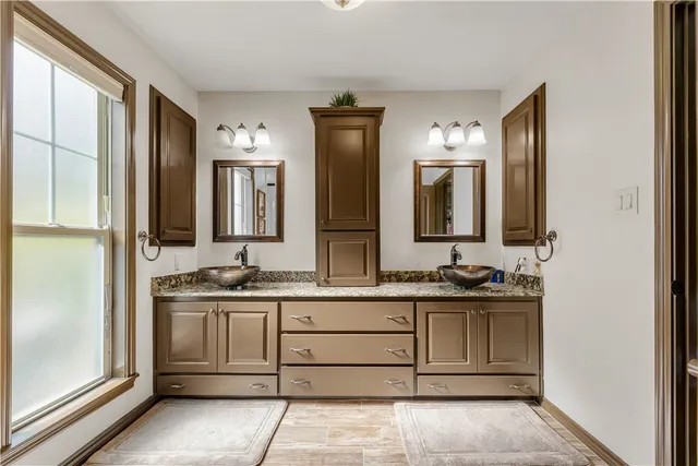 a bathroom with a shower and a toilet