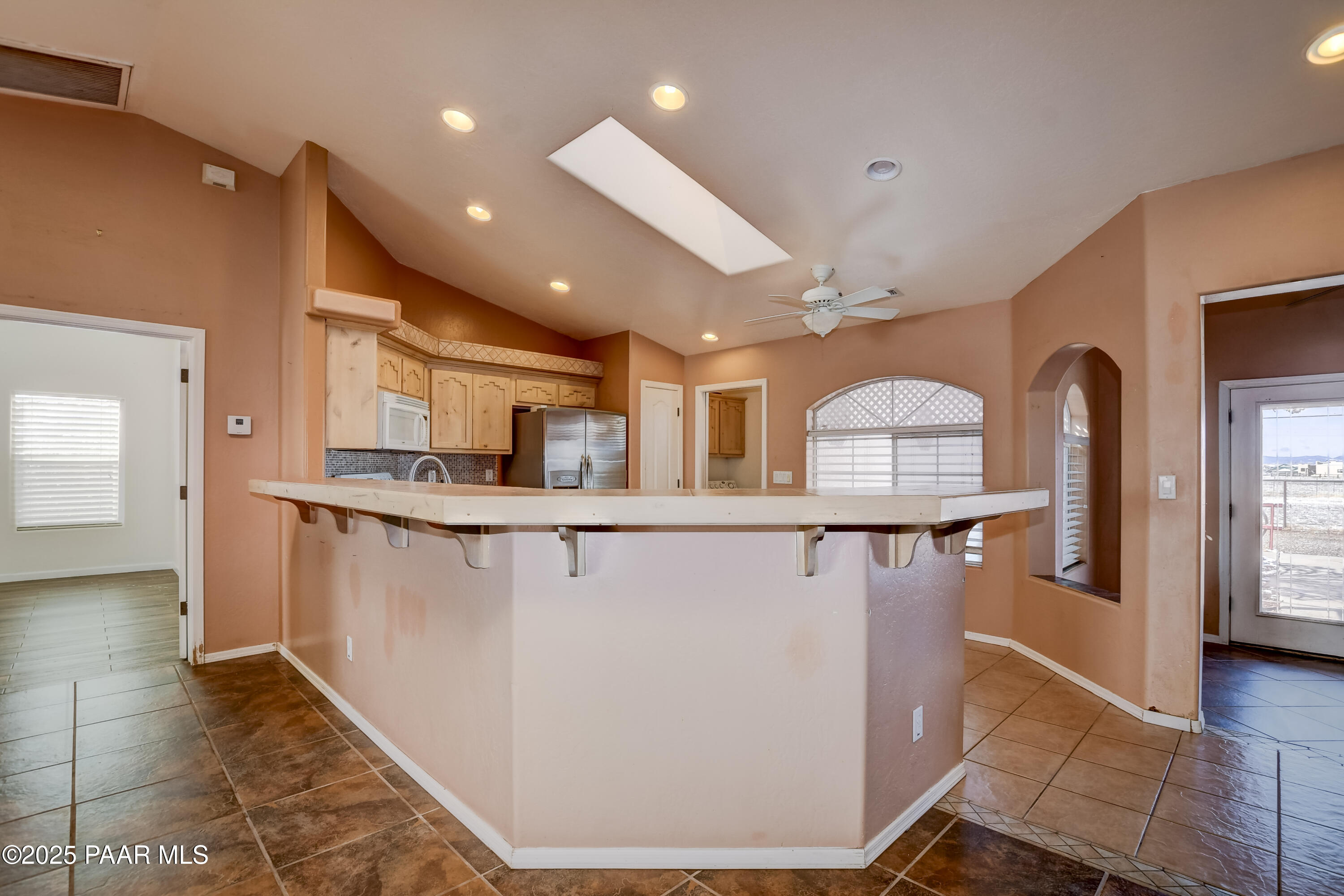 9100 East Lonesome Valley Road Prescott Valley, AZ 86315 - Photo 12 of 66 Kitchen with Bar Height Counter