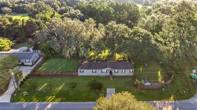 a kitchen with cabinets and white appliances