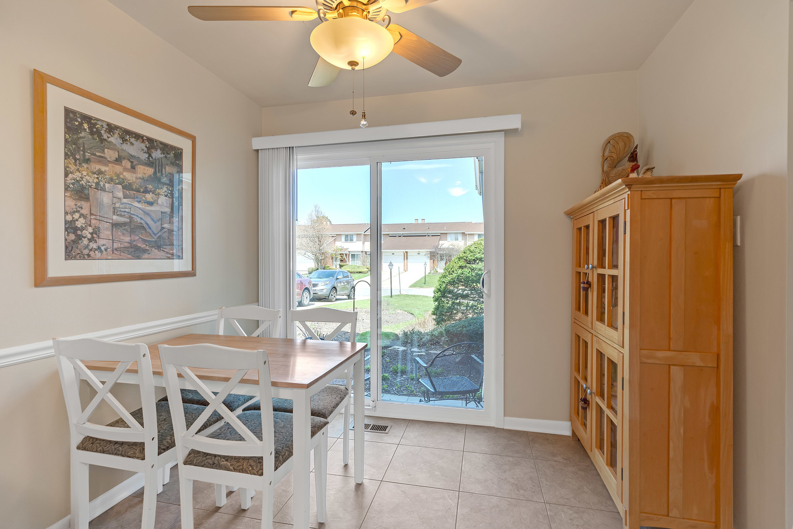 1256 Reading Court Wheaton, IL 60189 - Photo 11 of 34 a view of a dining room with furniture window and outside view