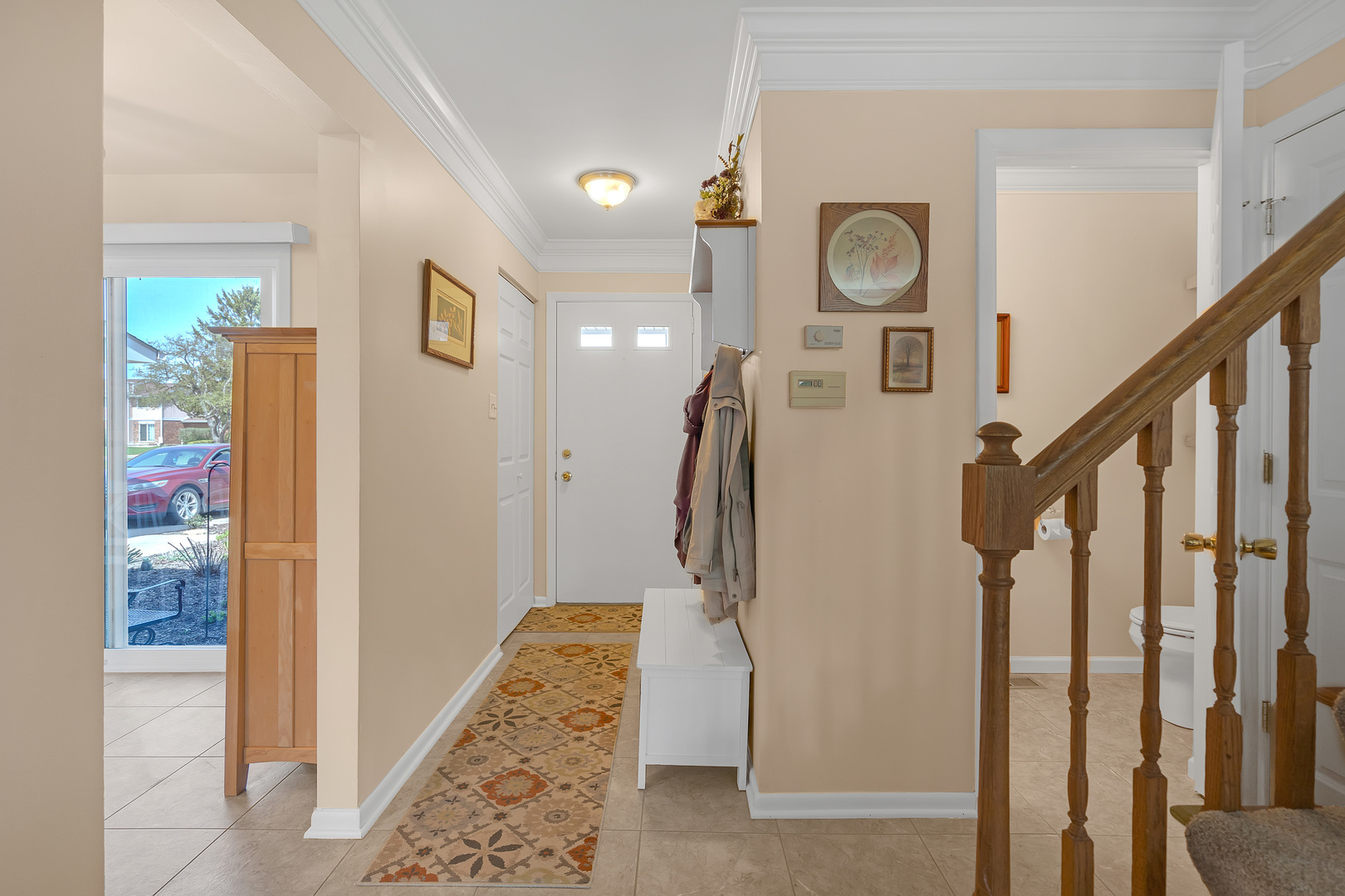 1256 Reading Court Wheaton, IL 60189 - Photo 13 of 34 a view of a hallway with entryway and hall