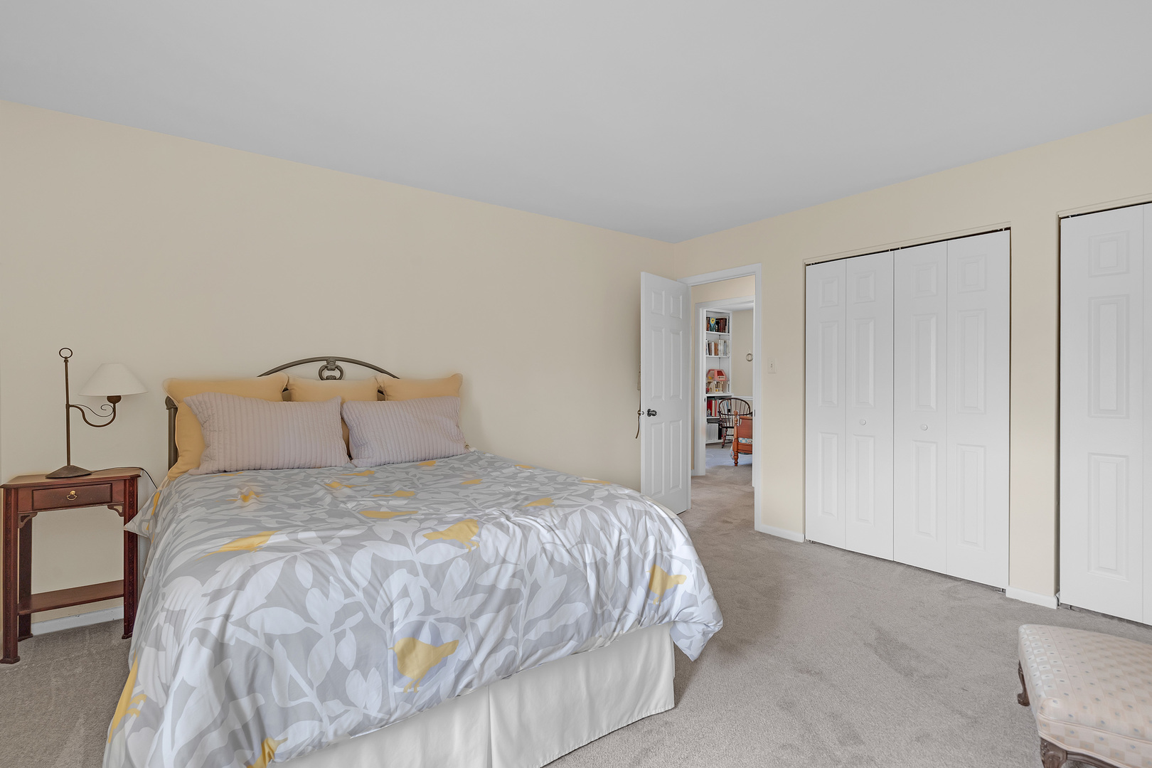 1256 Reading Court Wheaton, IL 60189 - Photo 18 of 34 a bedroom with a bed and a lamp