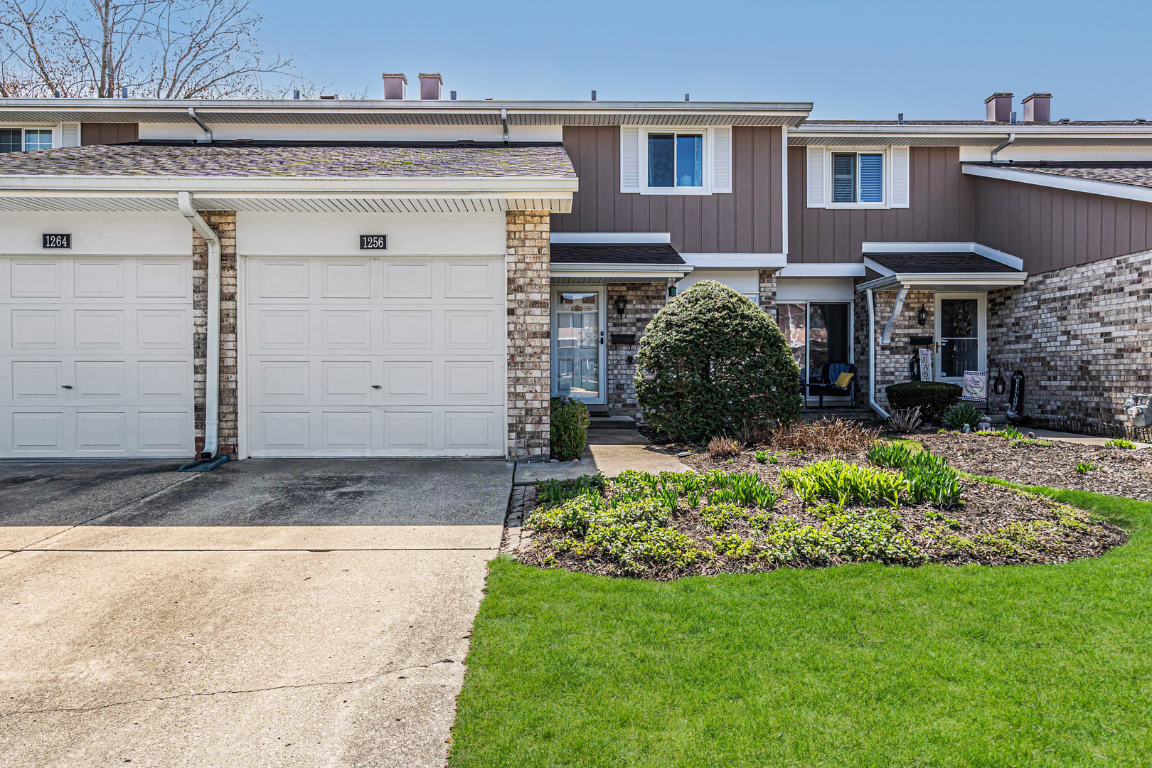 1256 Reading Court Wheaton, IL 60189 - Photo 2 of 34 a view of a house with a garden