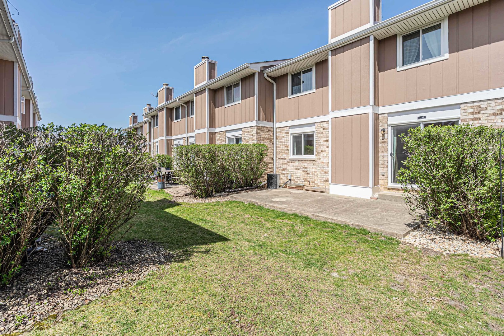 1256 Reading Court Wheaton, IL 60189 - Photo 27 of 34 a front view of a house with garden