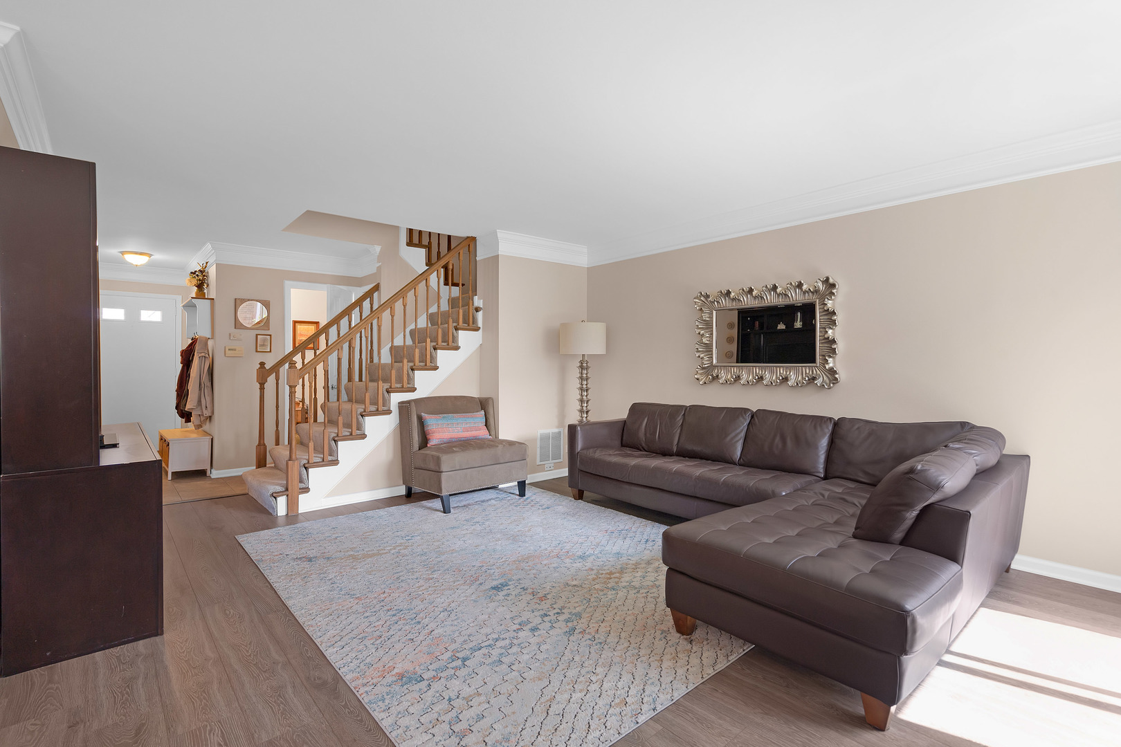 1256 Reading Court Wheaton, IL 60189 - Photo 6 of 34 a living room with furniture and stairs