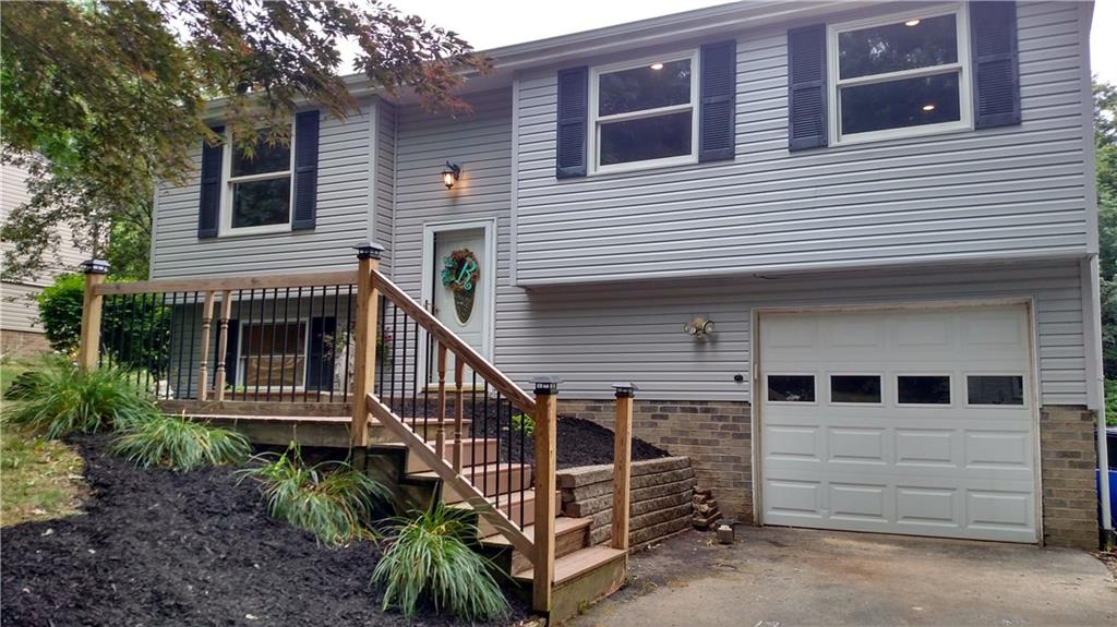 131 Squirrel Hollow Road Gibsonia, PA 15044 - Photo 2 of 17 Composite boards on front porch! Fresh landscaping!
