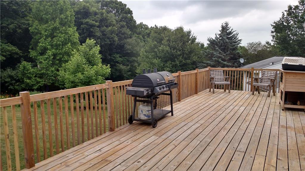 131 Squirrel Hollow Road Gibsonia, PA 15044 - Photo 3 of 17 This deck is massive! It covers the whole length of the house!
