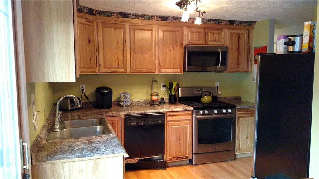 131 Squirrel Hollow Road Gibsonia, PA 15044 - Photo 9 of 17 Custom kitchen with upgraded formica countertops that have that granite look! Appliances negotiable.
