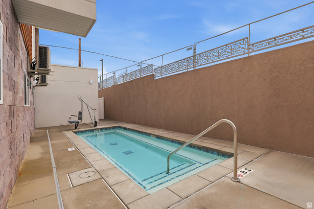 2085 North Main Street, Unit 409 Sunset, UT 84015 - Photo 15 of 17 View of heated spa with patio surround.