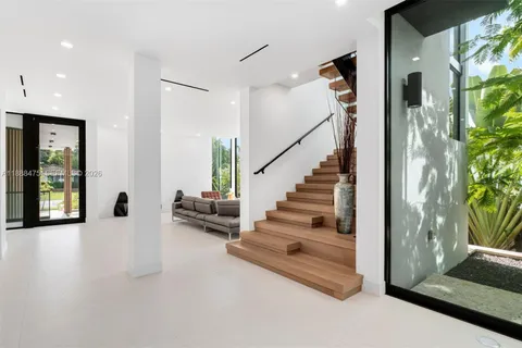a house view with a garden space