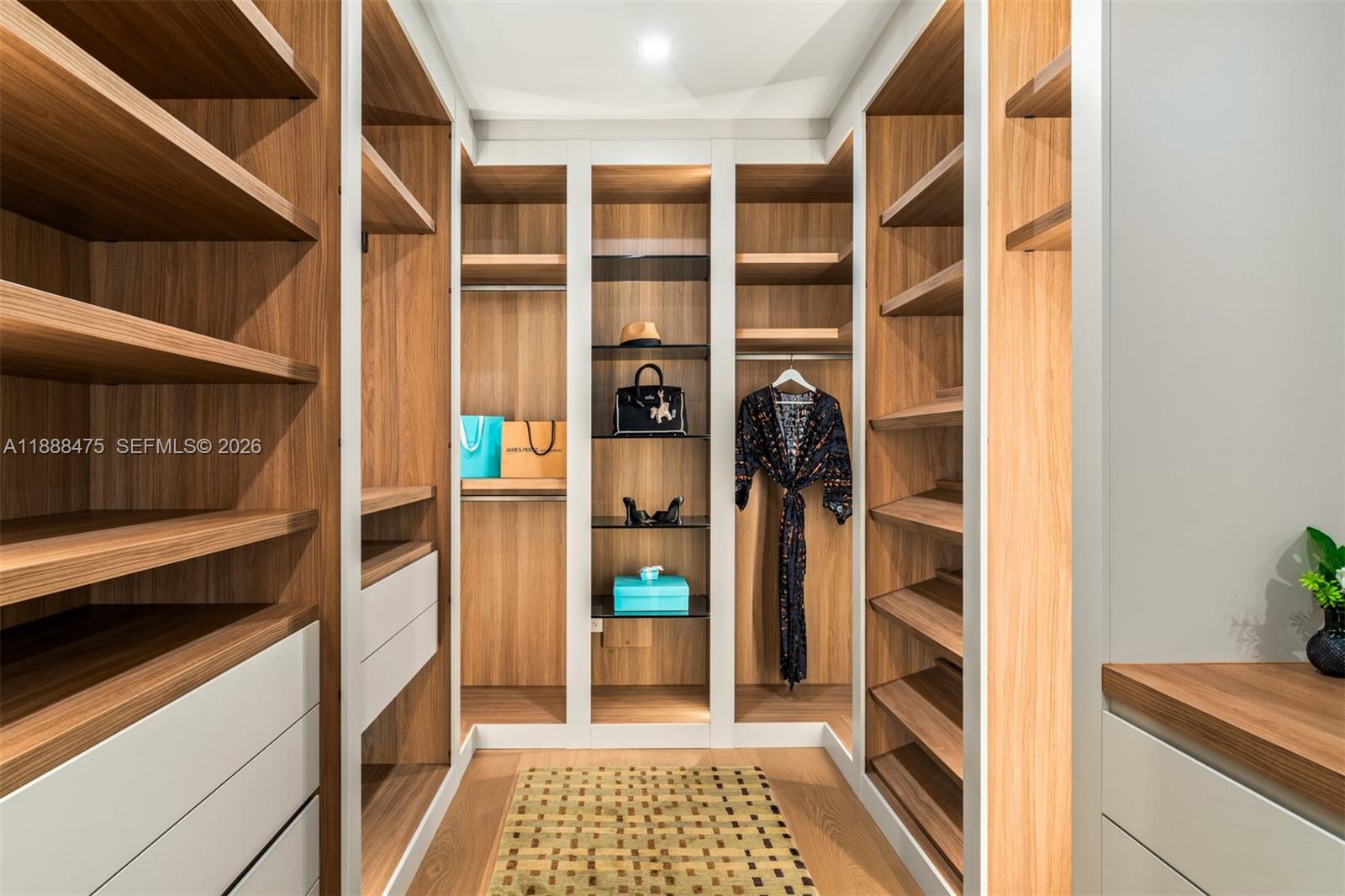 3114 Prairie Avenue Miami Beach, FL 33140 - Photo 26 of 56 a view of walk in closet with living room