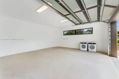 swimming pool view with a garden space