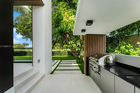 a picture of a bathroom with a shower