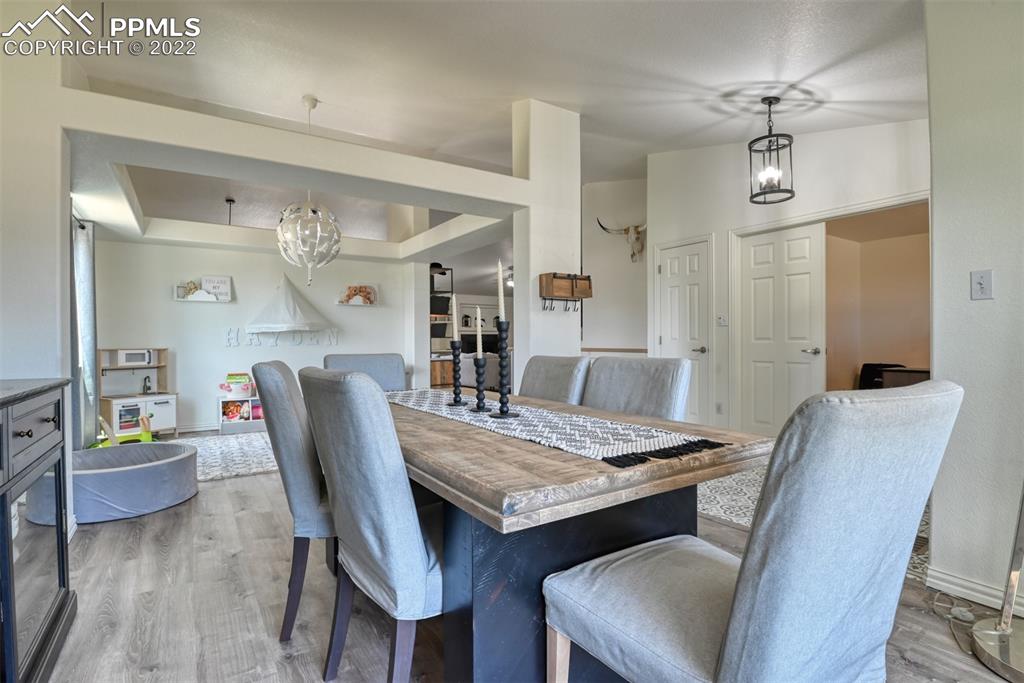 8820 Oakmont Road Peyton, CO 80831 - Photo 14 of 50 a view of a dining room with furniture