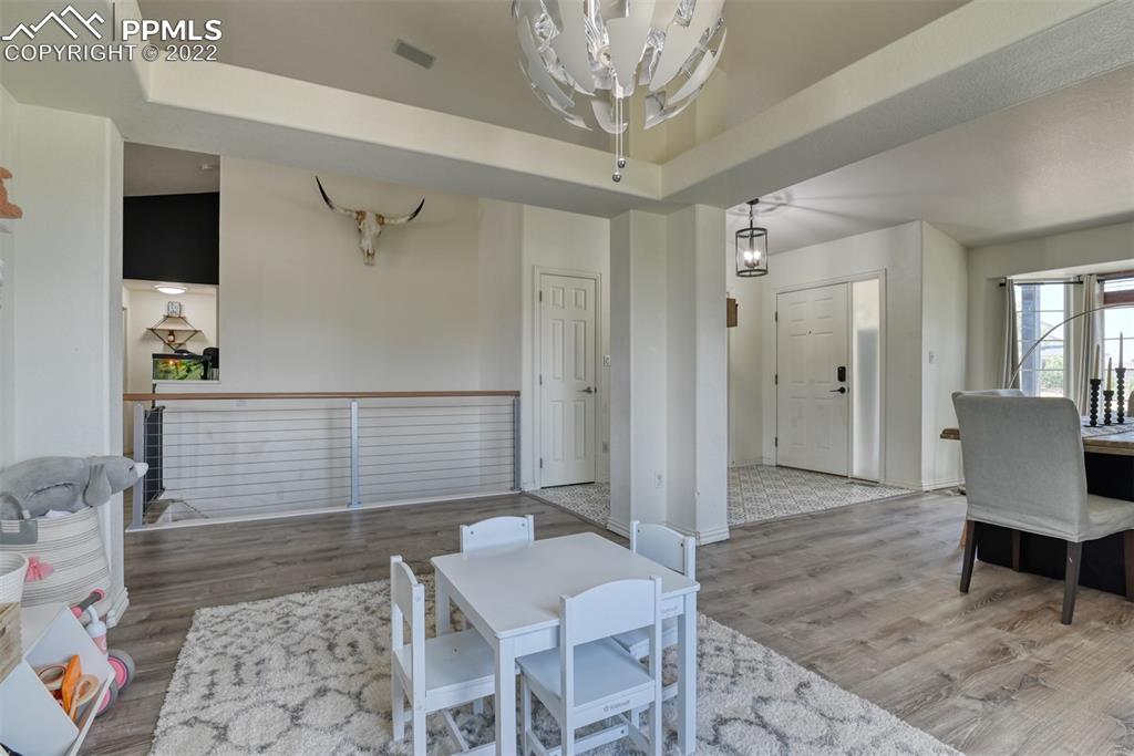 8820 Oakmont Road Peyton, CO 80831 - Photo 18 of 50 a view of a livingroom with furniture and windows