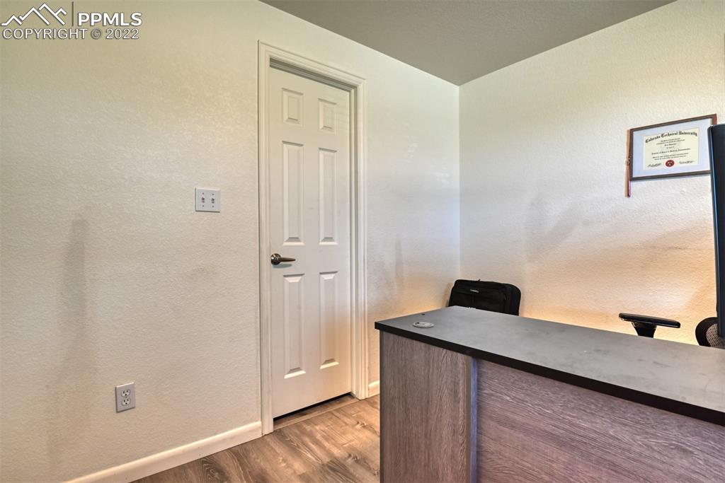 8820 Oakmont Road Peyton, CO 80831 - Photo 21 of 50 a view of a bedroom from the hallway