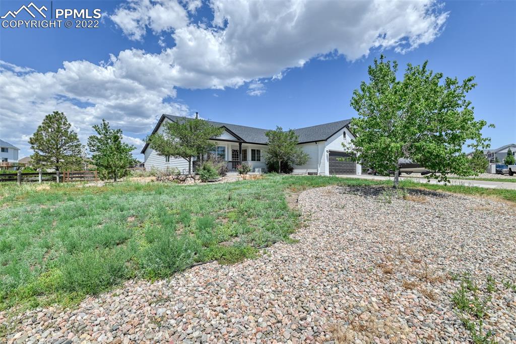 8820 Oakmont Road Peyton, CO 80831 - Photo 3 of 50 a view of a backyard