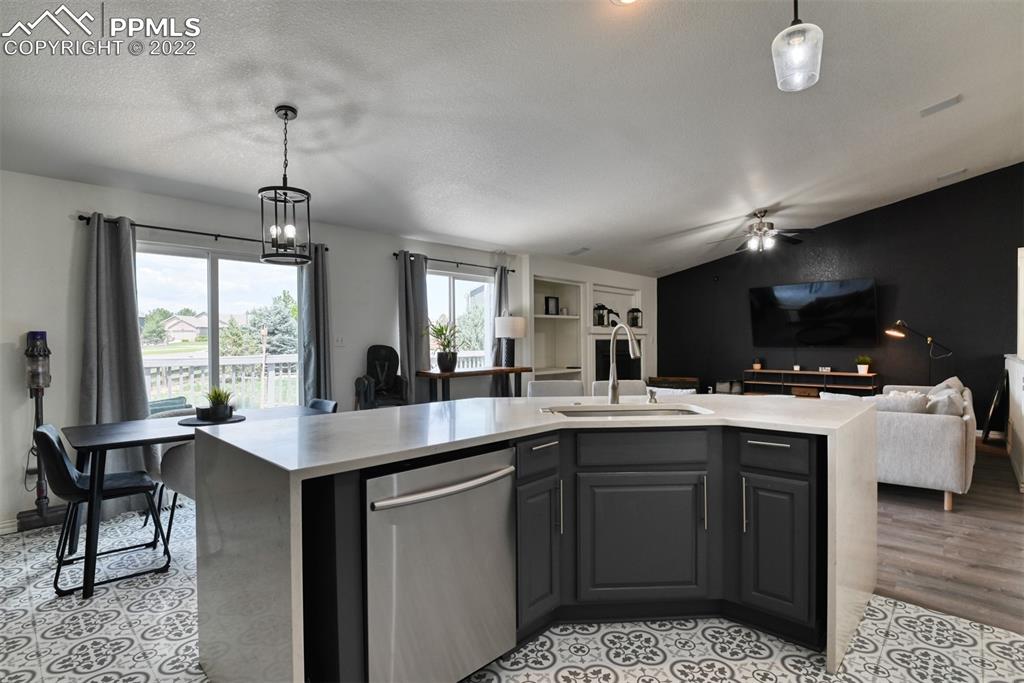 8820 Oakmont Road Peyton, CO 80831 - Photo 33 of 50 a kitchen with a sink and cabinets