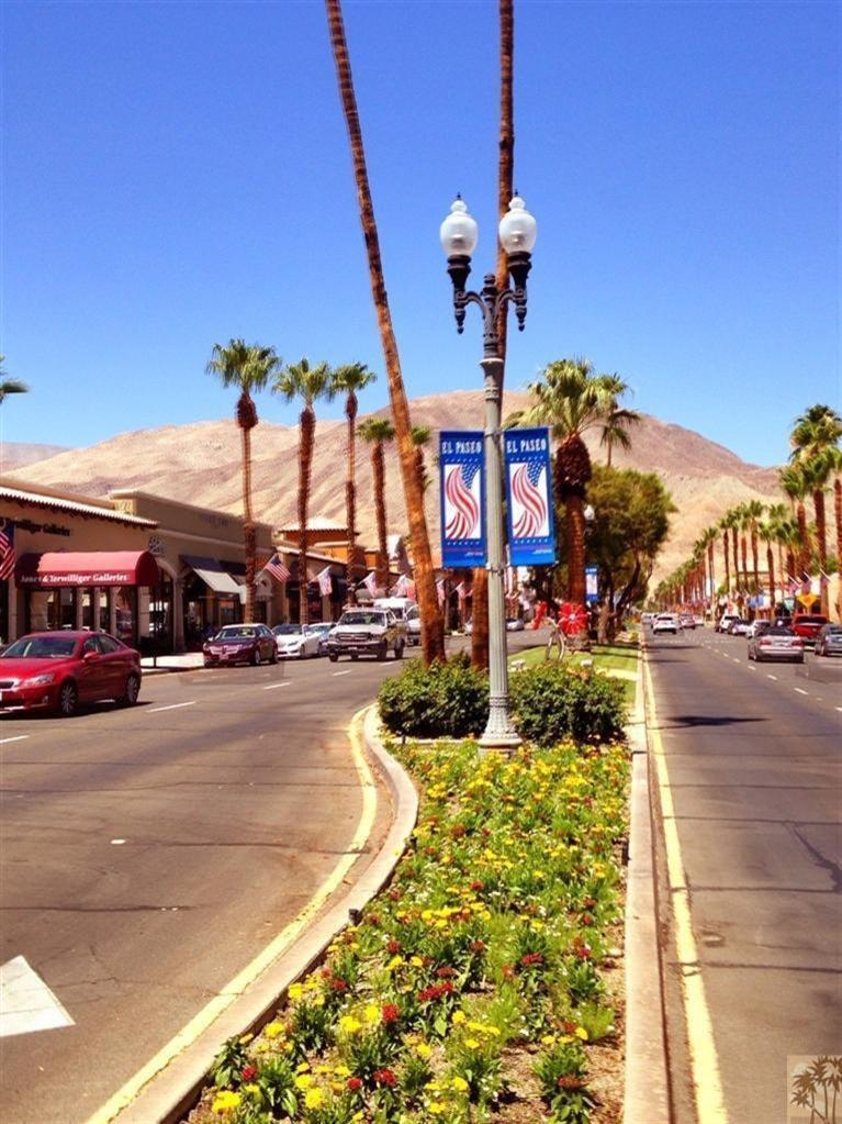73571 Haystack Road Palm Desert, CA 92260 - Photo 33 of 36 a view of a street with cars parked