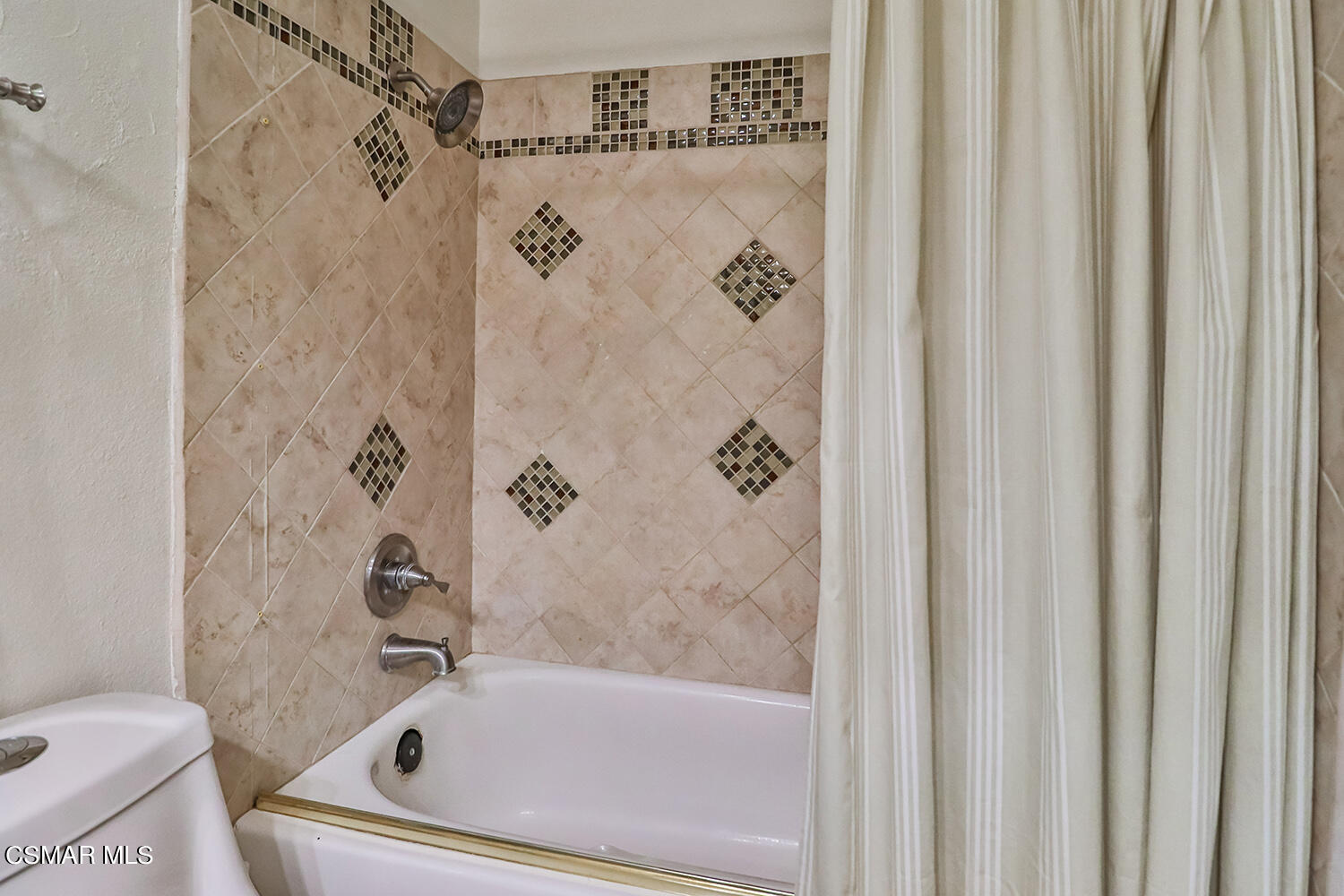 3964 Celia Court Simi Valley, CA 93063 - Photo 19 of 38 a bathroom with a bathtub and shower