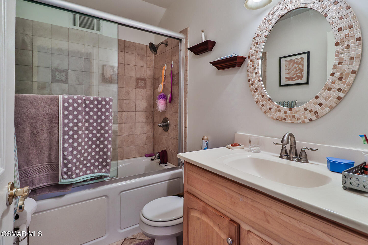 3964 Celia Court Simi Valley, CA 93063 - Photo 29 of 38 a bathroom with a sink a toilet and shower