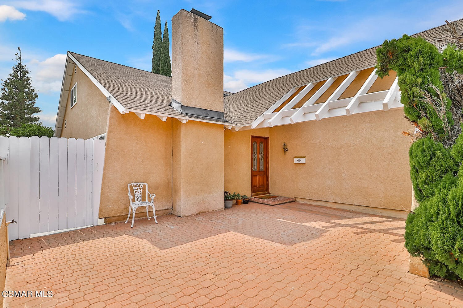 3964 Celia Court Simi Valley, CA 93063 - Photo 3 of 38 a backyard of a house with table and chairs