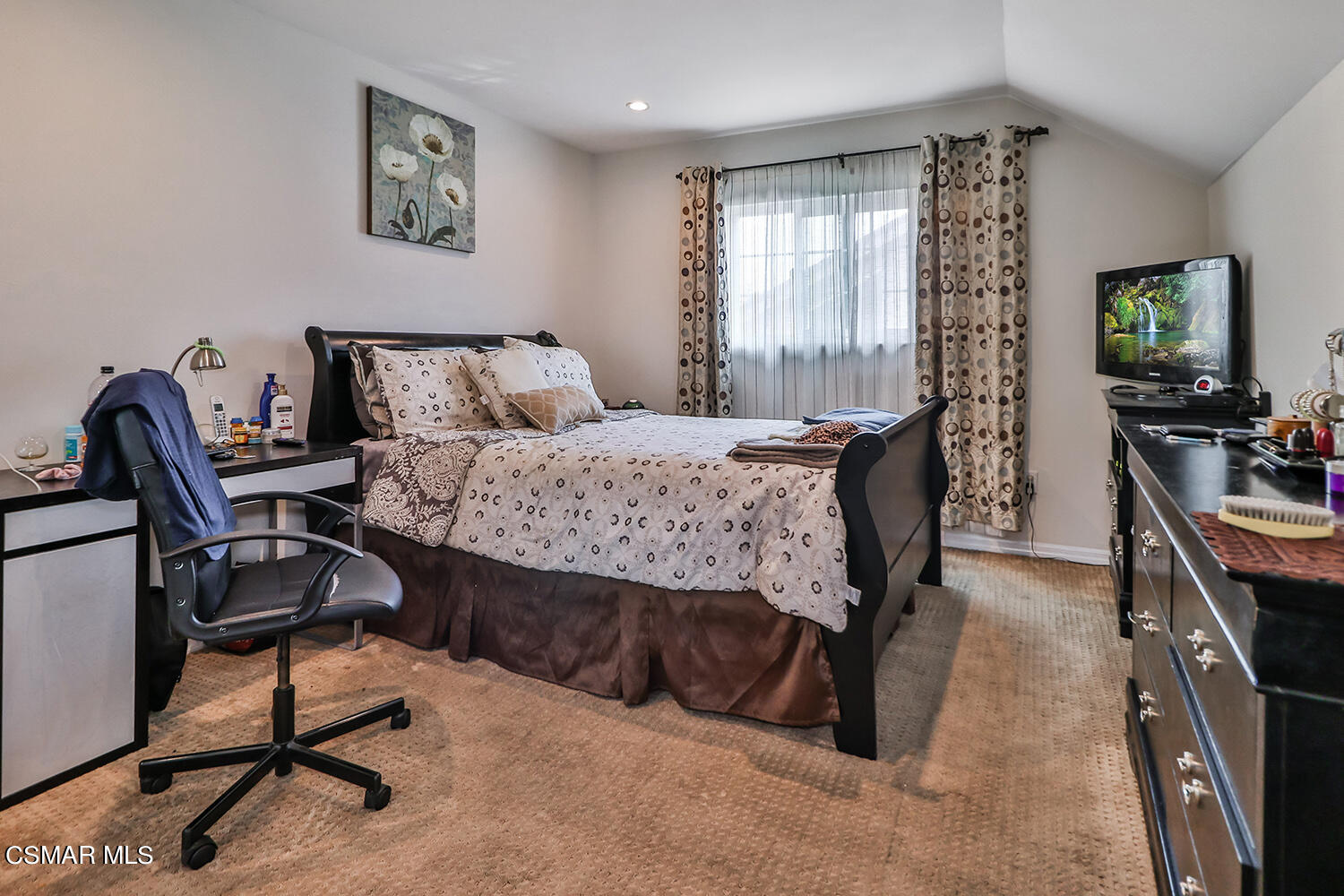 3964 Celia Court Simi Valley, CA 93063 - Photo 31 of 38 a bedroom with a bed a table and chair