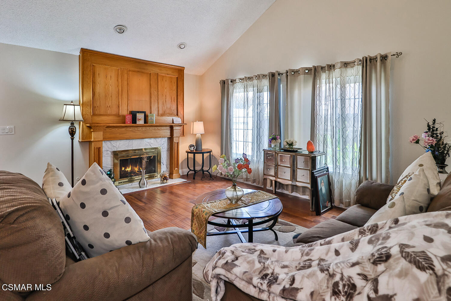 3964 Celia Court Simi Valley, CA 93063 - Photo 6 of 38 a living room with furniture and a fireplace