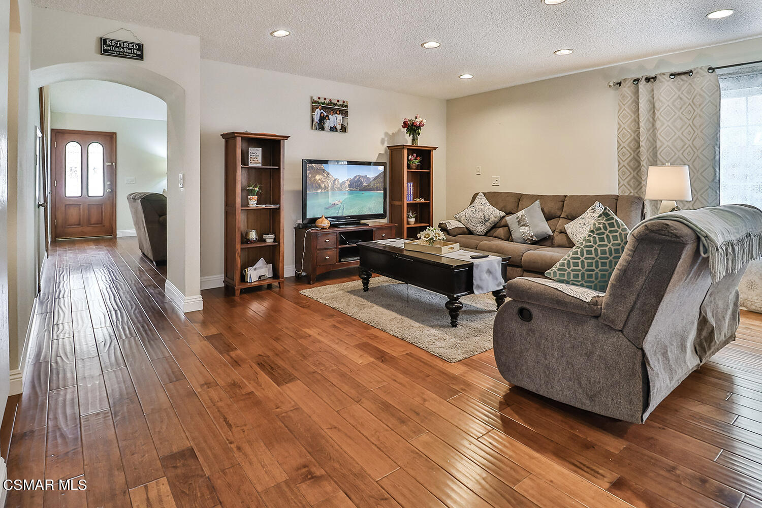 3964 Celia Court Simi Valley, CA 93063 - Photo 8 of 38 a living room with furniture and a wooden floor