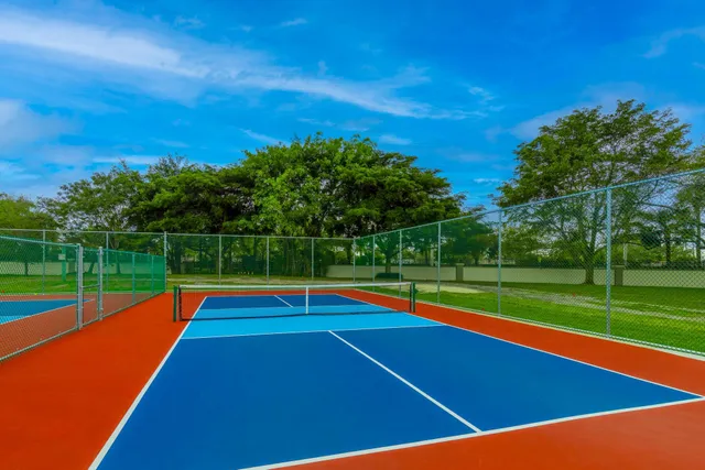 a view of an outdoor space with a swimming pool