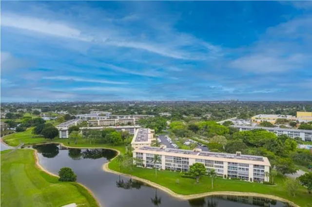 a view of a lake with a city