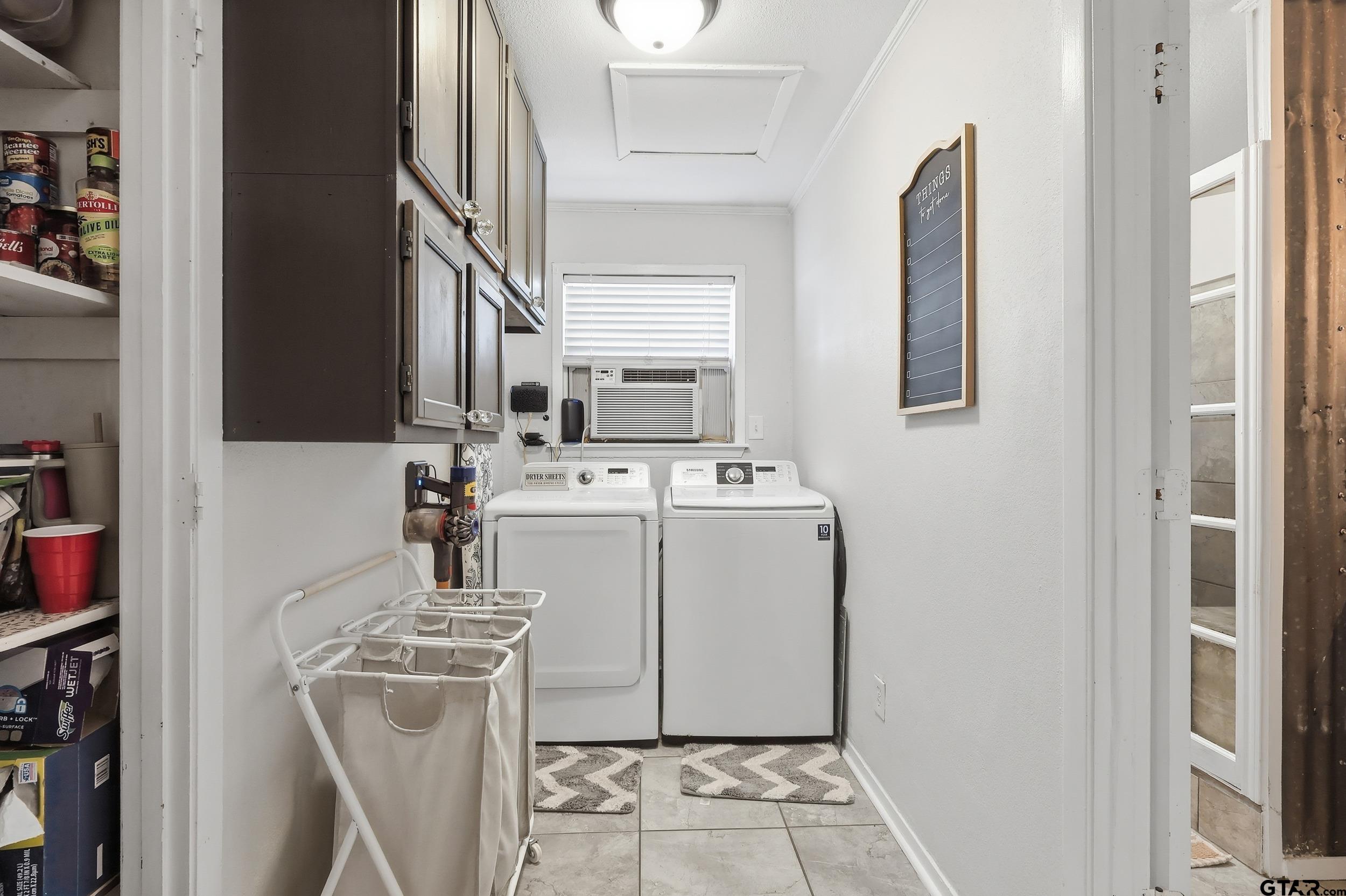 1775 County Road 1342 Pittsburg, TX 75686 - Photo 14 of 35 a utility room with dryer and washer