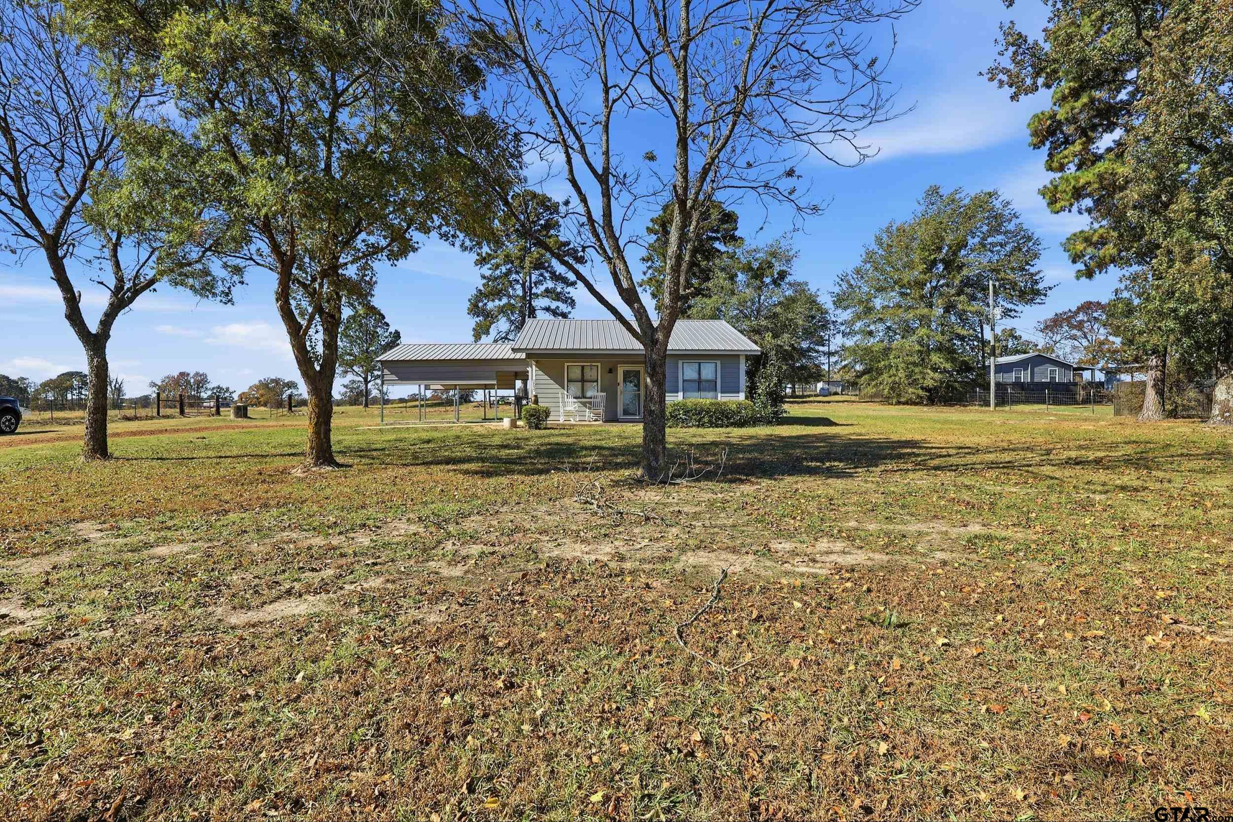 1775 County Road 1342 Pittsburg, TX 75686 - Photo 23 of 35 a view of swimming pool with tree s