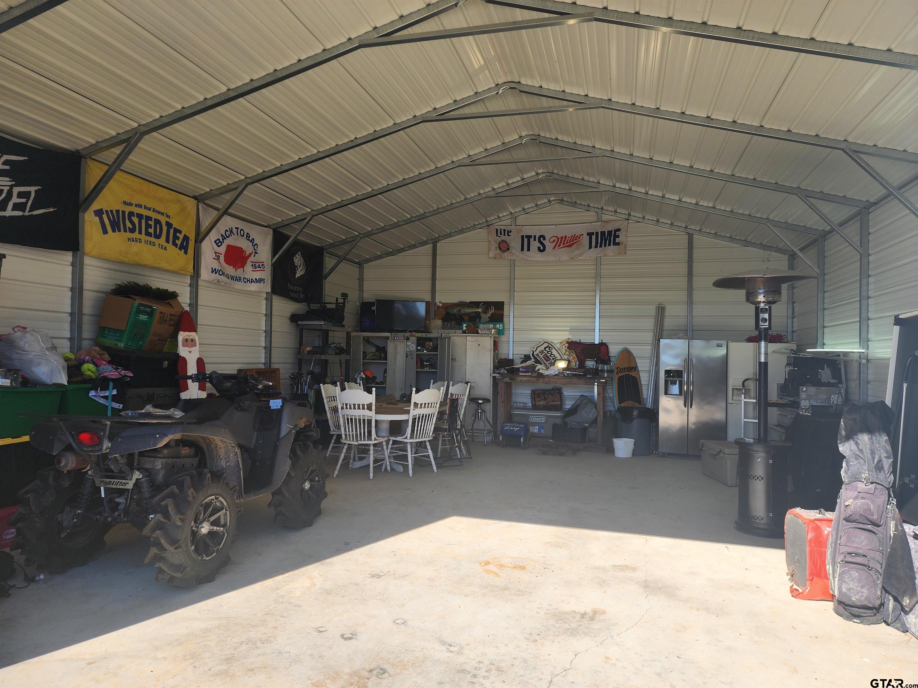 1775 County Road 1342 Pittsburg, TX 75686 - Photo 34 of 35 a view of a garage with chairs