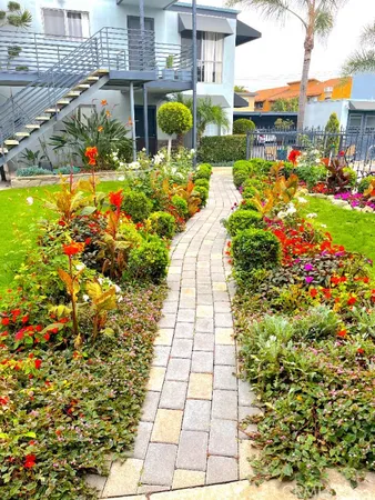 a view of swimming pool with sitting area