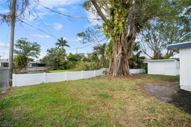 a view of a yard with an outdoor space
