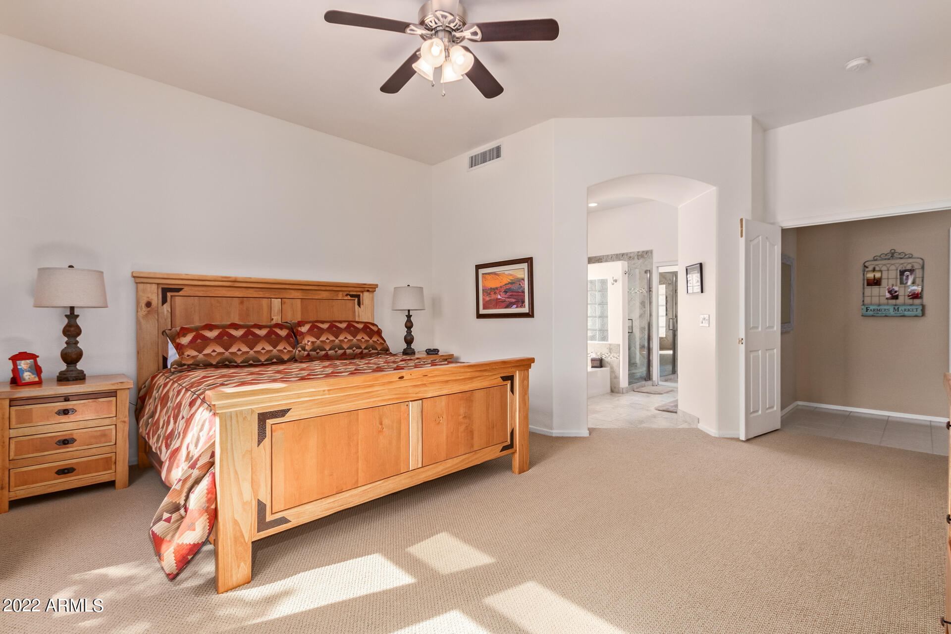 4515 East Jaeger Road Phoenix, AZ 85050 - Photo 14 of 27 a bedroom with bed and window