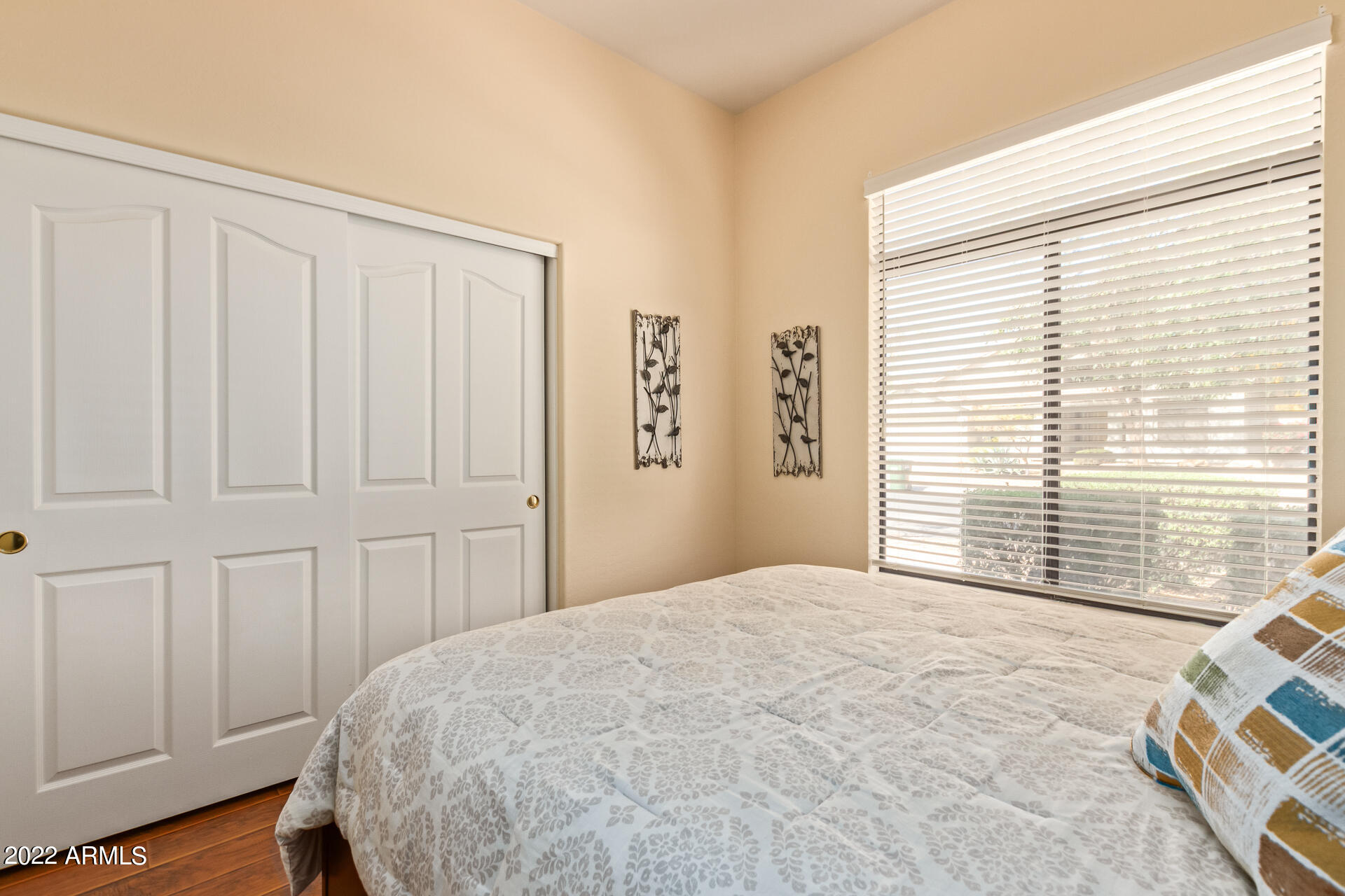 4515 East Jaeger Road Phoenix, AZ 85050 - Photo 20 of 27 a bedroom with a bed and a window