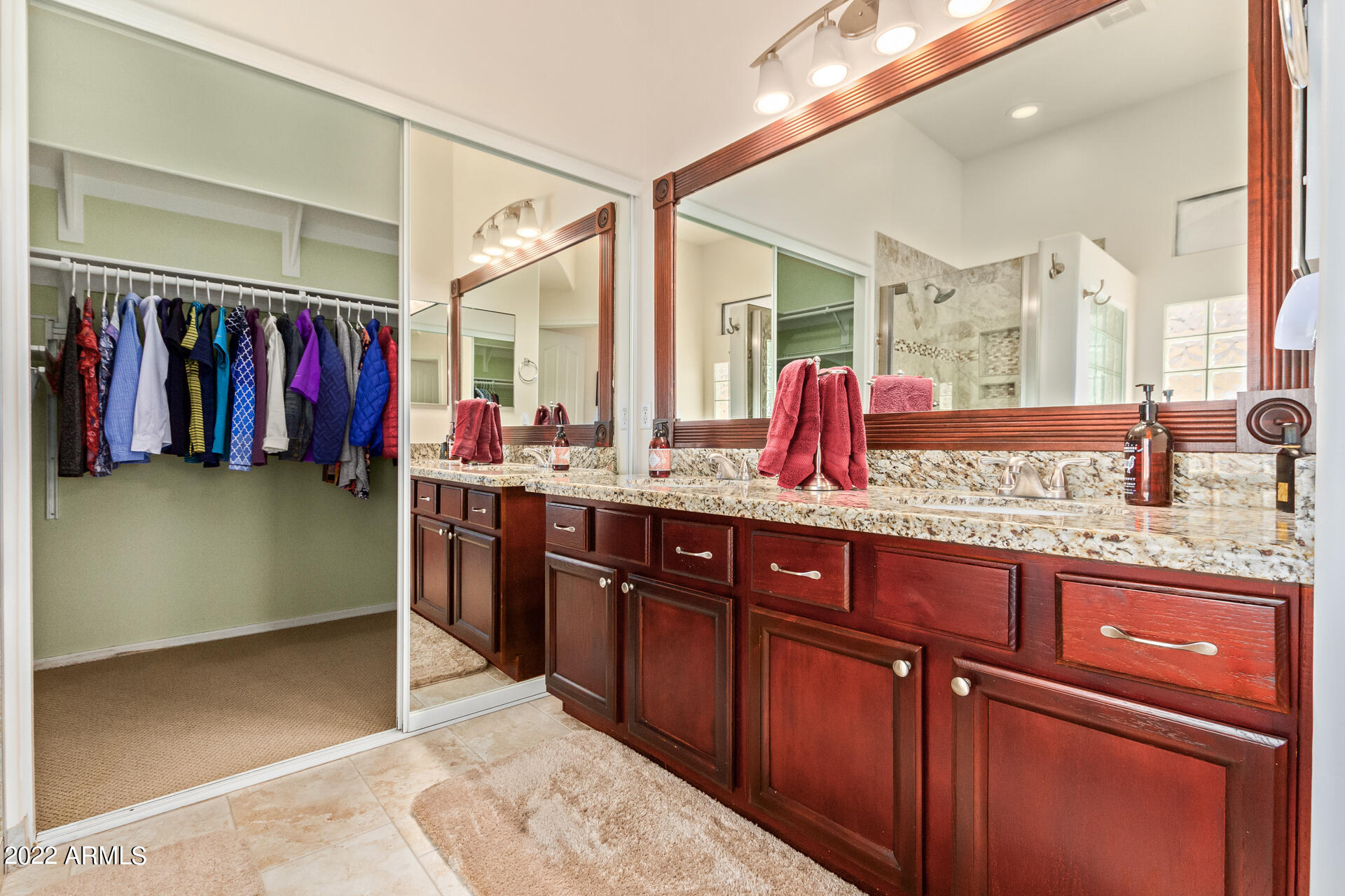 4515 East Jaeger Road Phoenix, AZ 85050 - Photo 5 of 27 a bathroom with a sink and a mirror