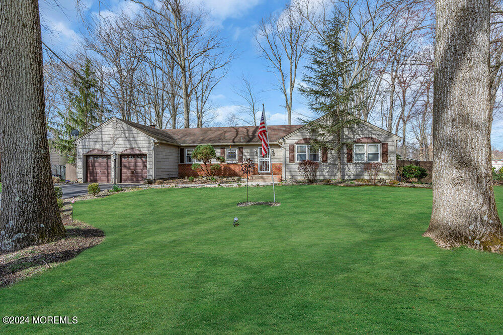 115 Stillwells Corner Road Freehold, NJ 07728 - Photo 3 of 47 a view of a house with a big yard
