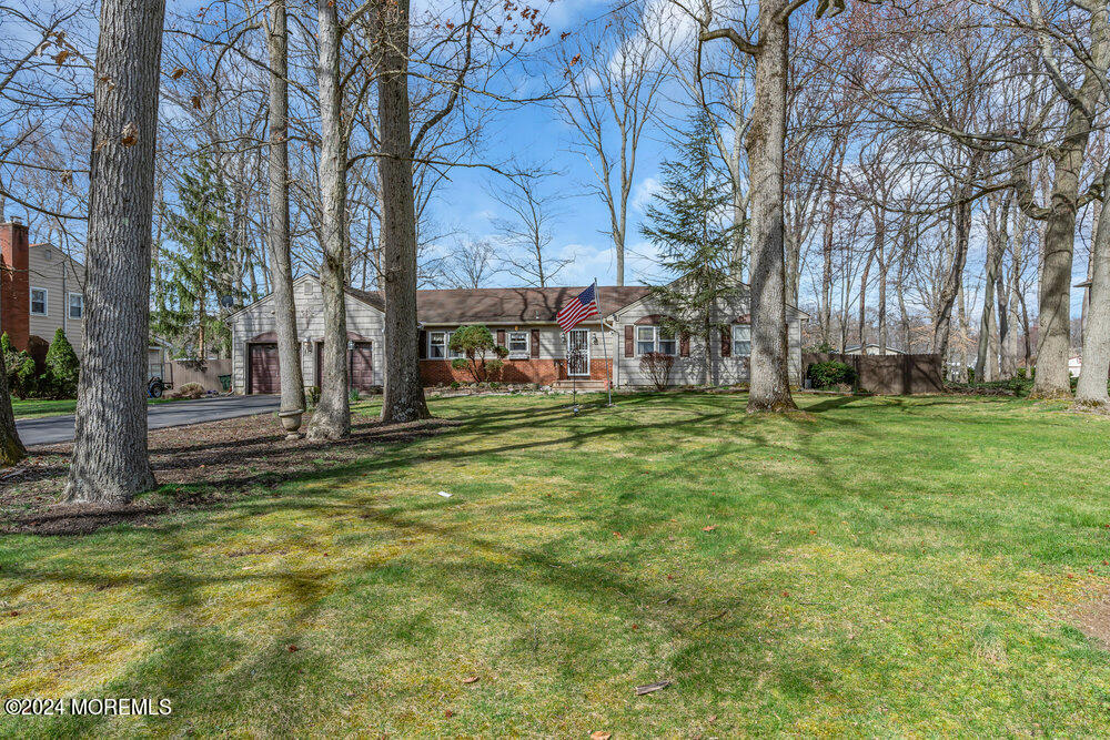 115 Stillwells Corner Road Freehold, NJ 07728 - Photo 46 of 47 a view of a park with large trees
