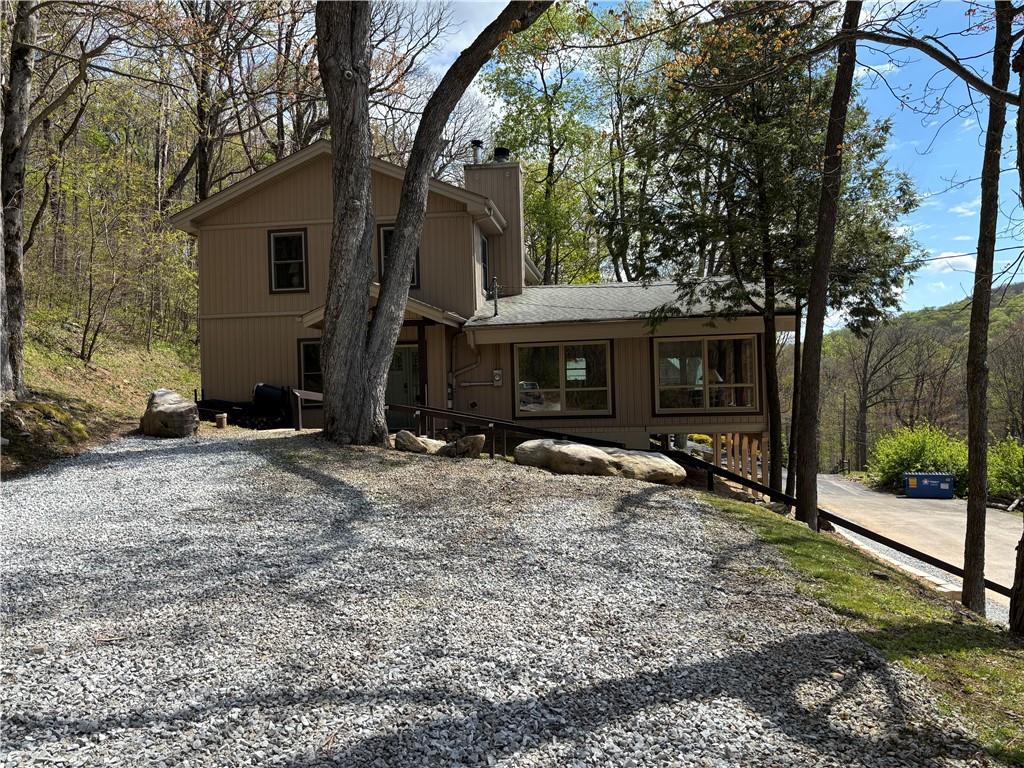 2226 County Line Road Champion, PA 15622 - Photo 3 of 33 a view of a house with backyard and trees