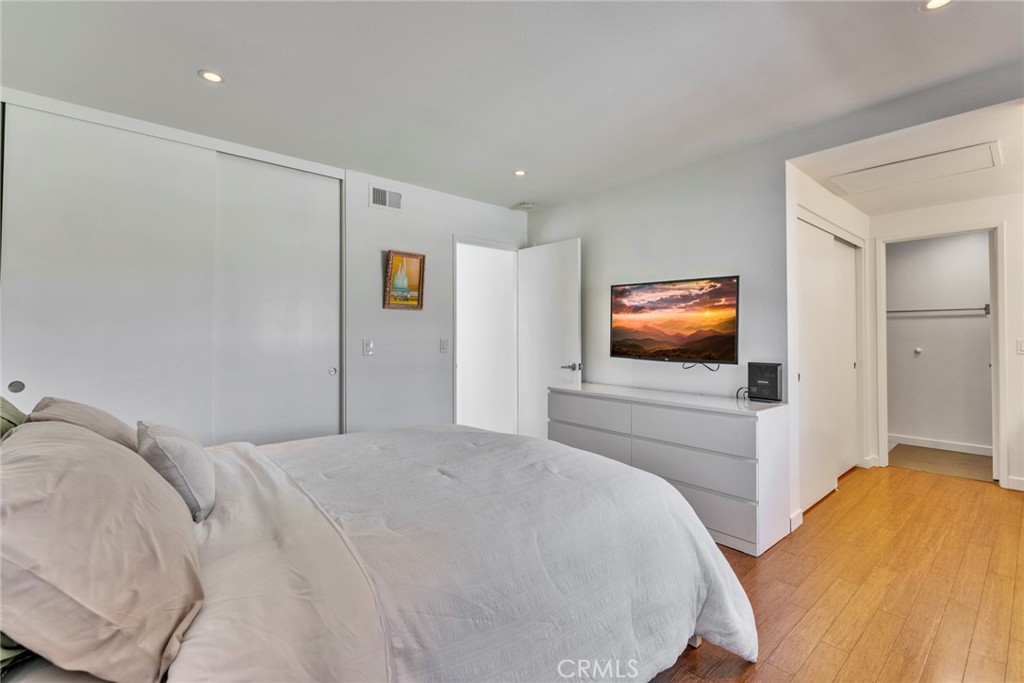 5 Hartford, Unit 36 Irvine, CA 92604 - Photo 11 of 37 a bedroom with a bed and a flat screen tv