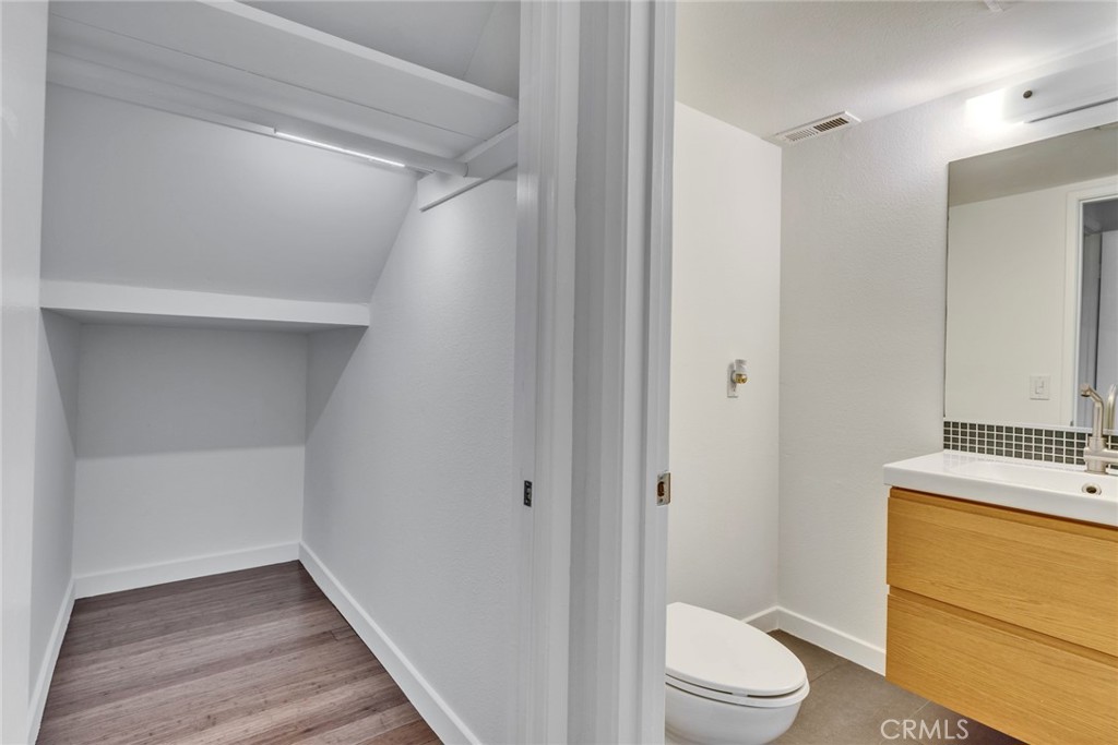 5 Hartford, Unit 36 Irvine, CA 92604 - Photo 19 of 37 a bathroom with a sink a toilet and shower