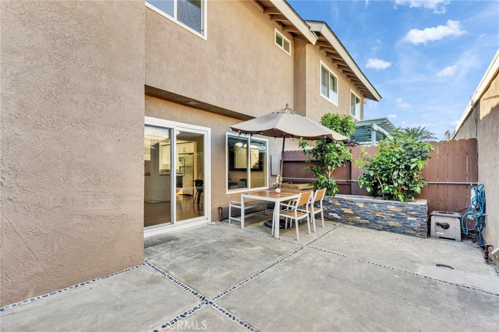 5 Hartford, Unit 36 Irvine, CA 92604 - Photo 25 of 37 a view of a outdoor space with a patio and garden