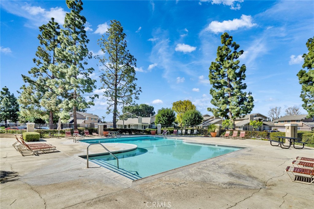 5 Hartford, Unit 36 Irvine, CA 92604 - Photo 32 of 37 a view of a park with swings and slides