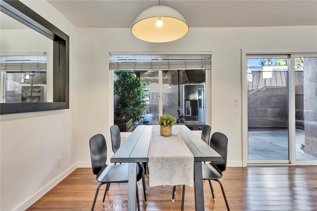 5 Hartford, Unit 36 Irvine, CA 92604 - Photo 8 of 37 a view of a dining room with furniture and wooden floor