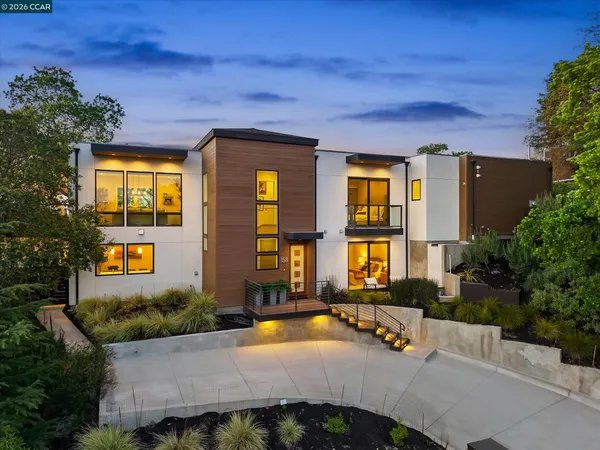a swimming pool with outdoor seating and yard