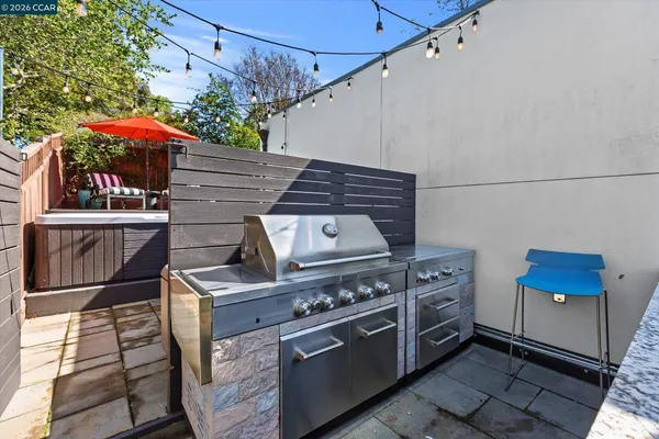 a view of a backyard with sitting area